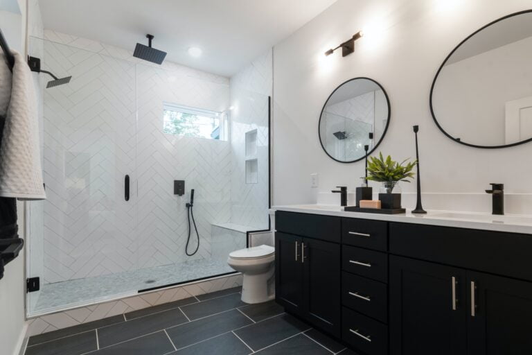 Bathroom Remodel, navy counters with white countertops, walk-in shower, minimal style
